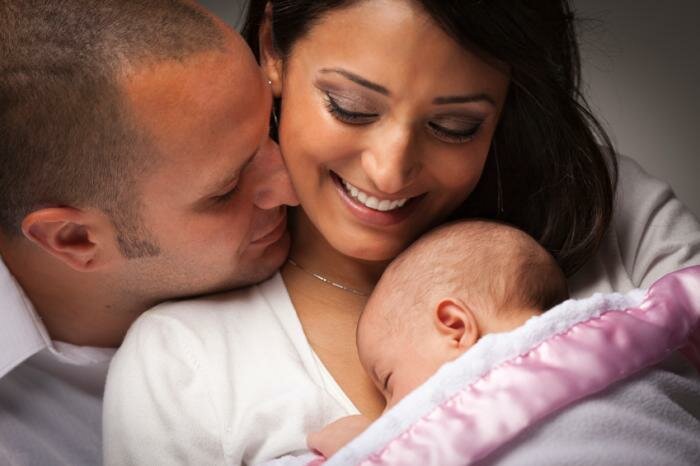  Eltern mit einem Baby