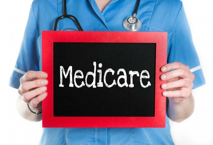  Krankenschwester, die Medicare- Zeichen
